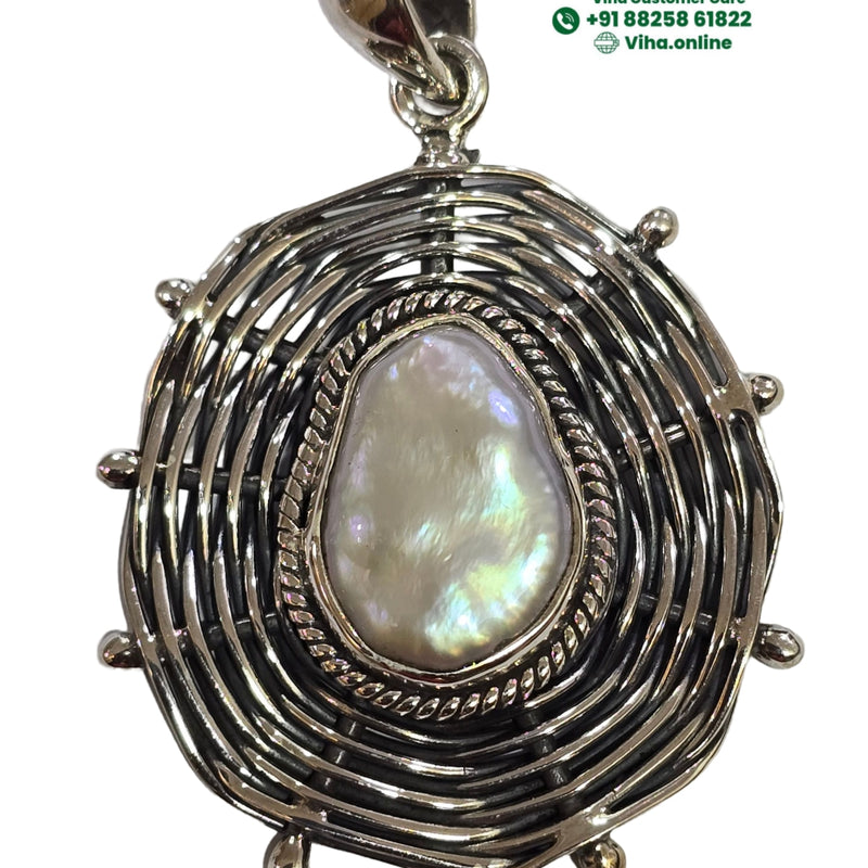 Original Pearl Designer Pendant In Pure Sterling Silver, irregular oval in a woven frame