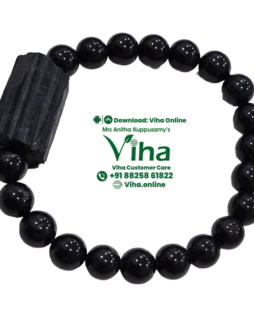 Black Tourmaline Bracelet, round black beads with a raw black crystal chunk as the centerpiece