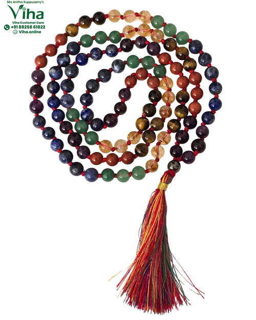 7 Chakra Stone Mala - 108+1 Beads, a coiled strand of beads ending in a tassel