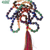 7 Chakra Stone Mala - 108+1 Beads, a jumble of colorful round beads on red cord ending in a multicolored tassel