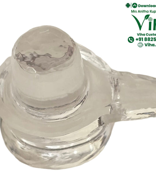 Sphatik Shivling with a clear asymmetrical sculpture and a ridged base structure