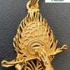 Impon Peacock Feather Flute Pendant, a gold-toned metal pendant with textured peacock feather and flute motifs holding two hands