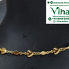 Impon Anklets, a gold-toned chain with alternating heart and diamond-shaped links, featuring a cluster of four hanging round bells at one end