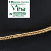 Impon Anklets, a gold-toned braided metal chain with two dangling round bells and one heart charm displayed on a black stand