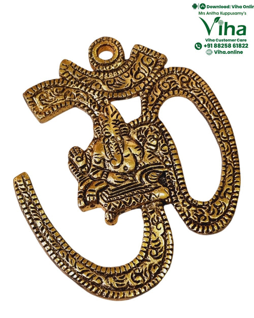 Om Ganesha Wall Hanger, a gold-toned ornate pendant with intricate patterns and a central figure motif