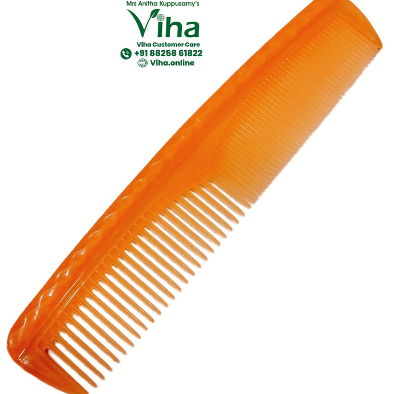 Hair Comb, amber translucent plastic comb with wide teeth on one side, fine on the other