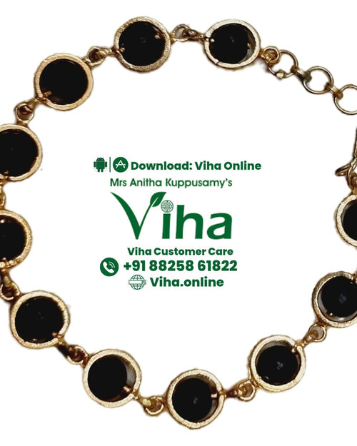Impon Karungali Bracelet, a gold-toned link bracelet featuring ten round black settings with an adjustment chain and hook clasp