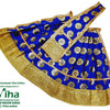 Amman Pavadai Set, a royal blue garment featuring gold-toned floral motifs and ornate gold-toned borders on the flared skirt and matching sash