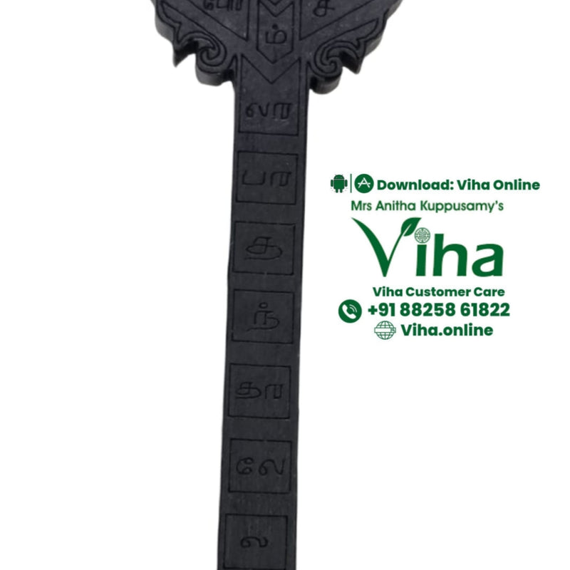 Karungali Sastra Bandham Vel, a black staff with matte finish featuring an ornate leaf-shaped top and tiered circular base, engraved with symbols