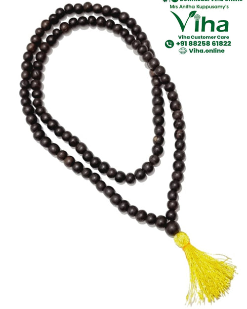 Karungali Mala 105+1 Beads, a looped strand of matte dark brown beads with a bright yellow thread tassel at the bottom