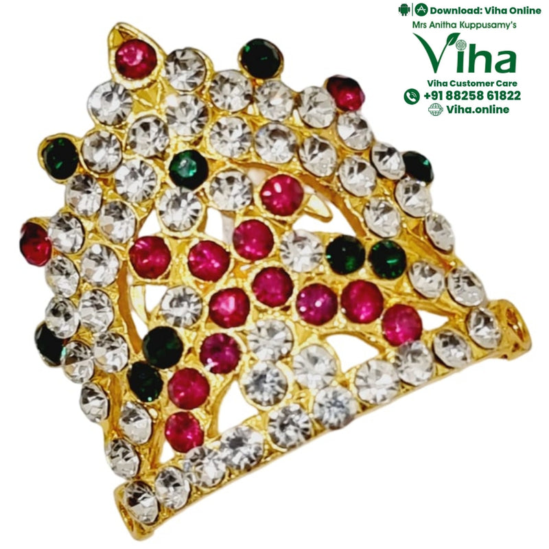 Crown for God & Goddess, a gold-toned ornament with clear, red, and dark green stones embedded