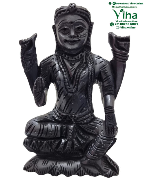 Karungali Balambika, seated figure carved in black karungali wood with the arms raised