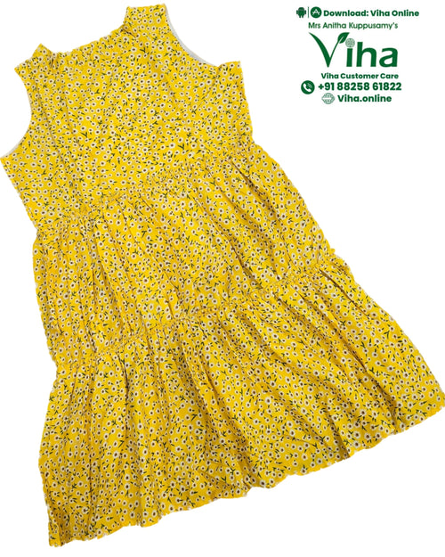 Women Shirt / Peplum Top - Sleeveless, yellow with white and black floral pattern, sleeveless