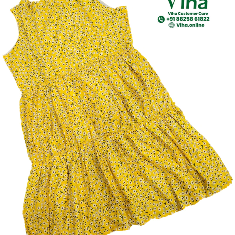 Women Shirt / Peplum Top - Sleeveless, yellow with white and black floral pattern, sleeveless