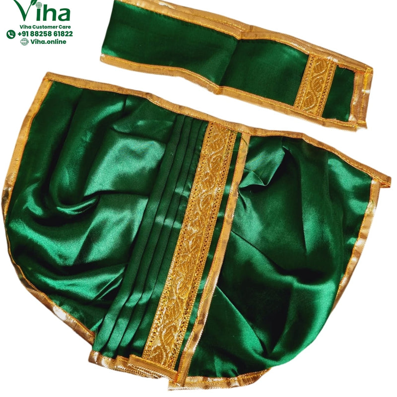 Ganesha Dhoti Set, a shiny green fabric set featuring a pleated skirt with a gold-toned patterned border and a matching top trim