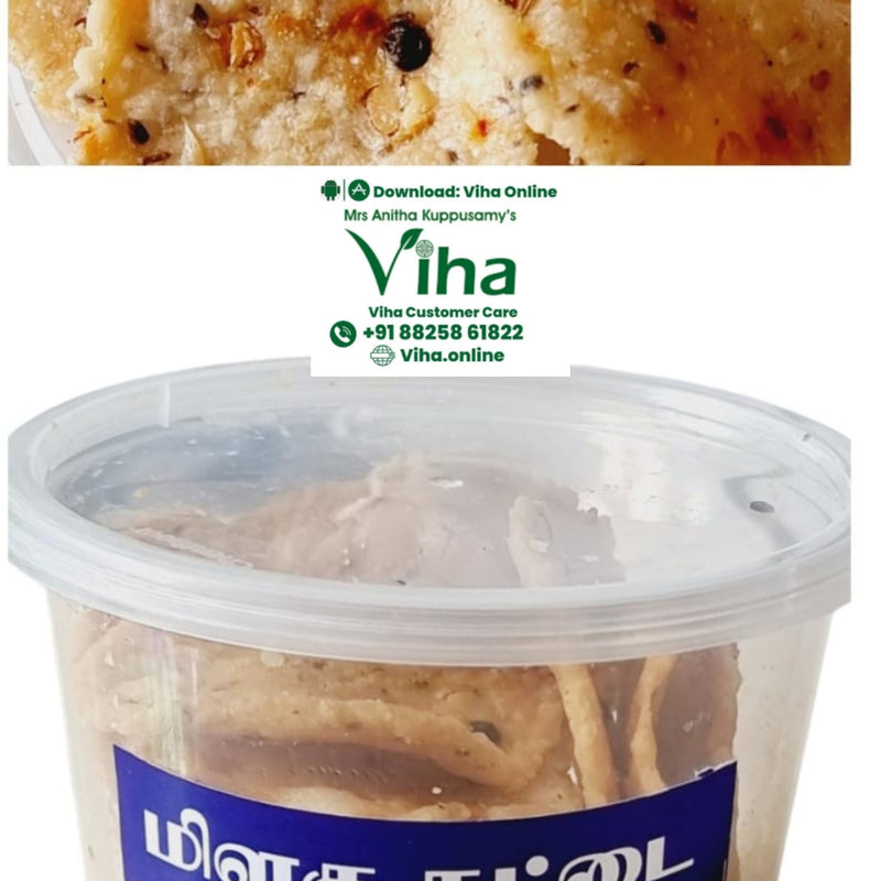 Tasty Milagu Thattai, a clear plastic container with a lid holds multiple golden-brown round flat snacks with dark spots, featuring a blue label with white text