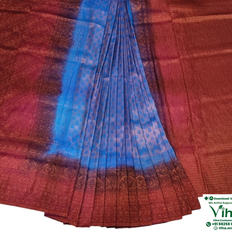 Soft Silk Saree With Blouse & With Stone Work, a pleated fabric with a bright blue center and red-toned patterned borders and ends
