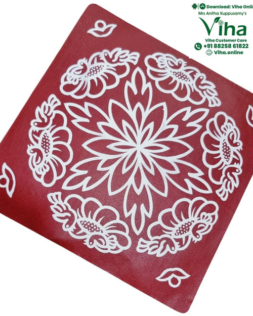 Rangoli Sticker, a white floral kolam design printed on a red square