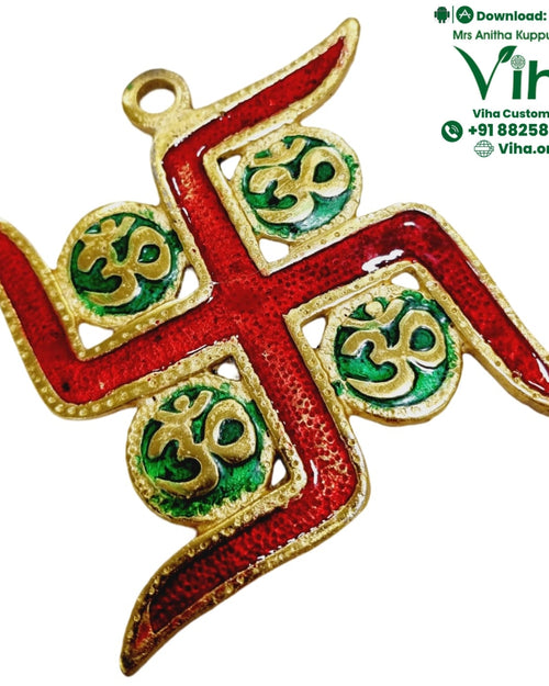 Swastik Om Wall Hanging, a gold-toned symbol with a red base, a hanging loop on top and four green circles holding small symbols