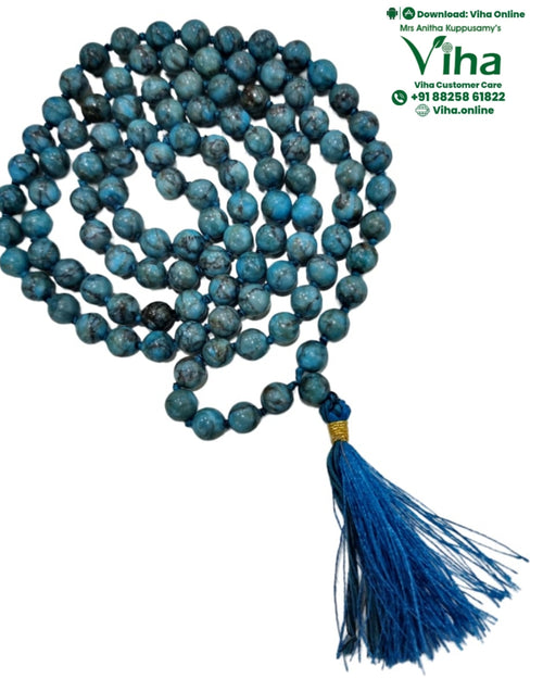 Turquoise Mala with a tassel and knotted thread