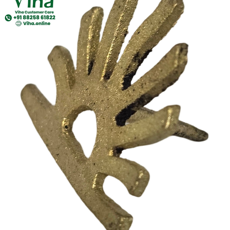 Surya Bindi Stamp, a gold-toned textured metal object featuring ten outward-radiating finger-like projections and a central cutout