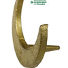 Chandra Bindi Stamp, a gold-toned crescent-shaped object with a textured surface and a single horizontal protrusion on its back
