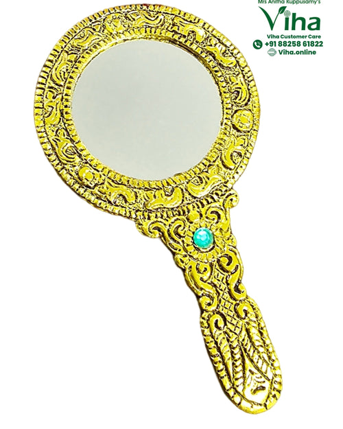 Antique Hand Mirror, gold-toned engraved mirror with a turquoise stone on the handle