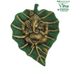 Green Leaf Ganesha Wall Hanger, a green leaf-shaped plaque with a textured surface and gold-toned figural relief