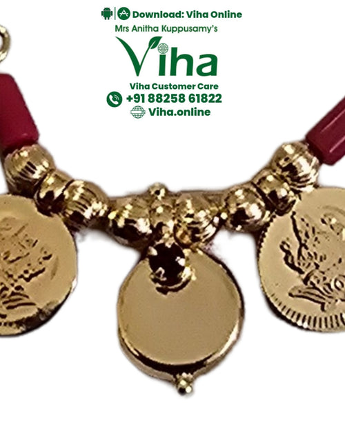 Impon Thali with Beads, a curved gold-toned ornament with two red beads, ten small ribbed beads and three round coins with raised designs