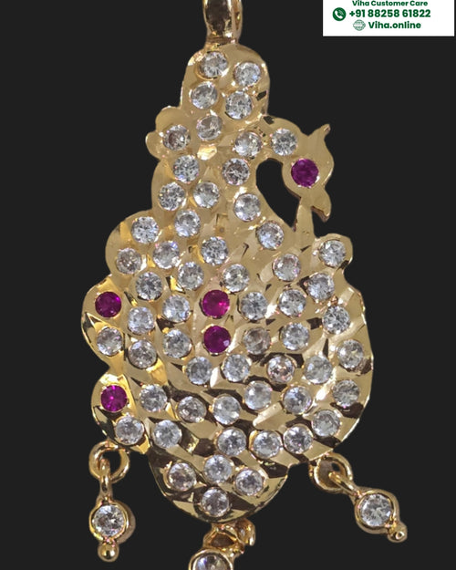 Impon Pendant in a stylized bird shape with hanging elements and clear and pink stones