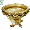 Tortoise Urli, brass bowl with small bells hanging from rings around the rim, on a tortoise-shaped base with engraved shell