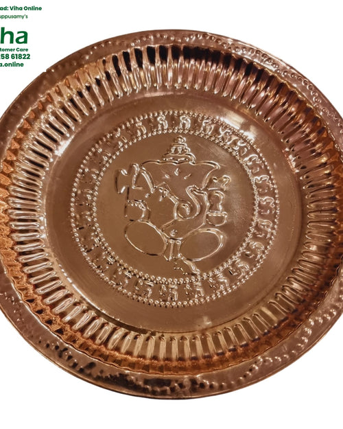 Copper Ganesha Plate, copper plate with seated Ganesha embossed at the centre, a ring of engraved script and a fluted rim