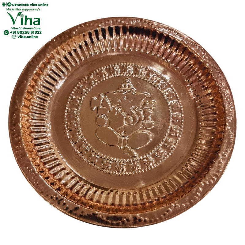 Copper Ganesha Plate, copper plate with seated Ganesha embossed at the centre, a ring of engraved script and a fluted rim