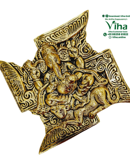 Swastik Rat Ganesha Wall Hanger, a gold-toned metal relief plaque depicting an elephant-headed figure and an animal with swirling patterns