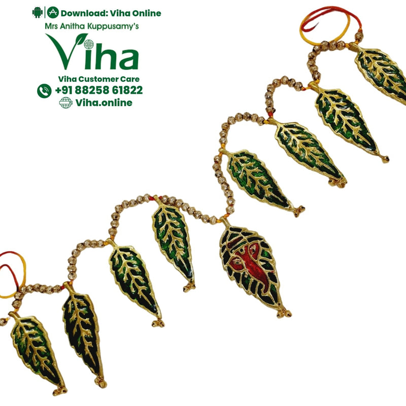 Leaf Ganesha Thoran, a string of gold-toned beads interspersed with eight green leaf-shaped pendants, one featuring a red and green figure