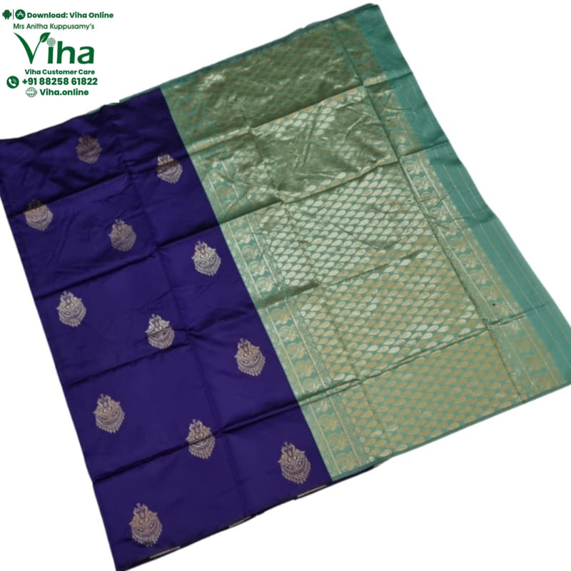 Soft Silk Saree with Blouse & with Grand Pallu, a folded blue and green textile with a gold-toned patterned section and ten embroidered motifs