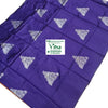 Soft Silk Saree with Blouse & with Grand Pallu, a purple folded fabric with shiny silver-toned triangular motifs featuring a bird and floral patterns