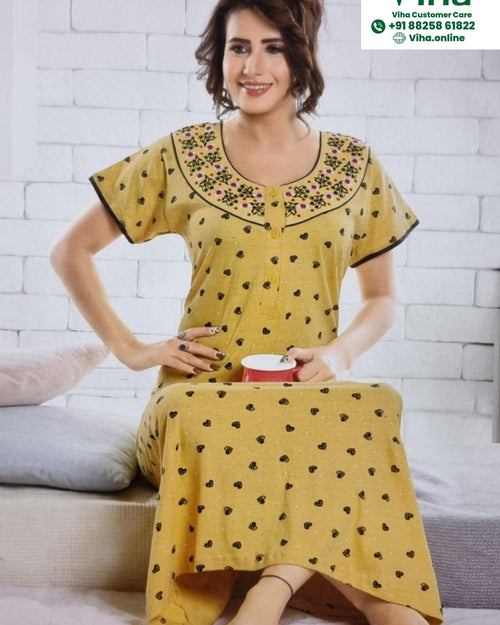 Stretchable (Baniyan) Cotton Nighty, a yellow cotton-fabric nighty featuring short sleeves, black heart prints, floral embroidery, and four buttons
