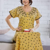 Stretchable (Baniyan) Cotton Nighty, a yellow cotton-fabric nighty featuring short sleeves, black heart prints, floral embroidery, and four buttons