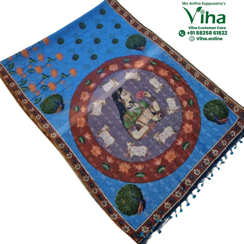 Soft Cotton Saree with Blouse in blue, printed with a central medallion of a woman among cows and a peacock border