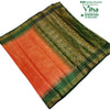 Soft Silk Saree with Blouse & with Grand Pallu, a neatly folded saree featuring a gradient of orange and red body, paired with dark green borders