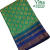 Soft Silk Saree with Blouse & with Grand Pallu, folded green-and-blue fabric with gold-toned woven patterns and a wide floral border