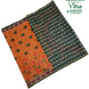 Soft Cotton Saree with Blouse & Pallu, an orange fabric with floral and polka-dot prints alongside a dark green fabric with repeated small white animal prints