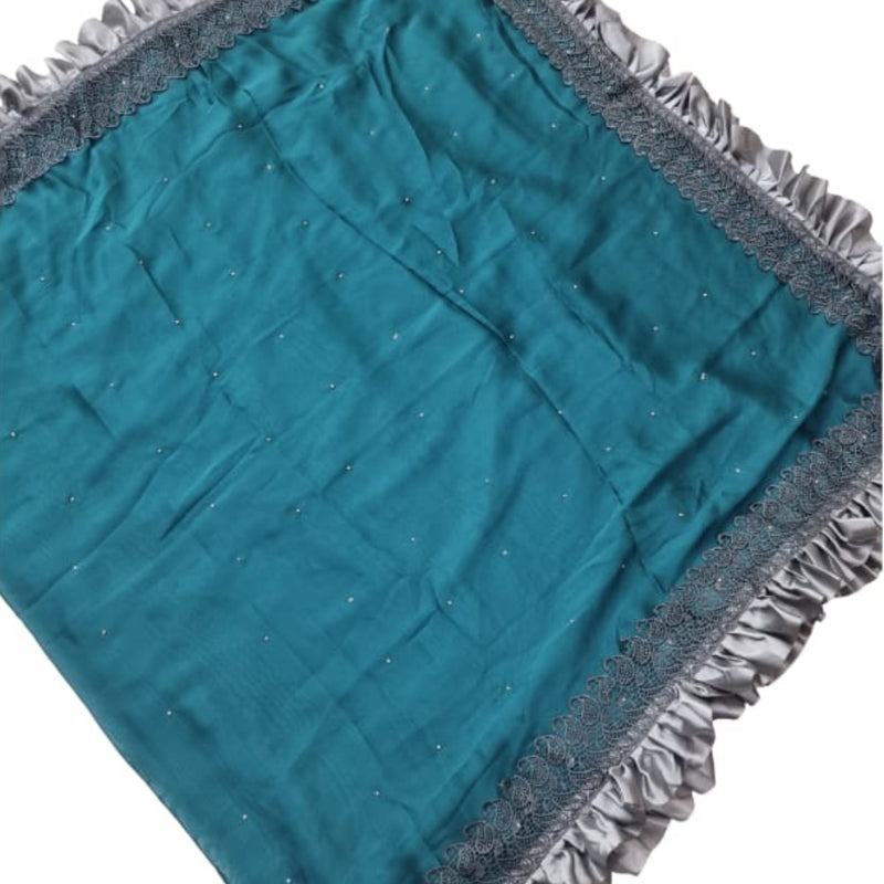 Designer Saree with Ruffle Work & with Blouse, a teal fabric with scattered white dots and a ruffled grey border