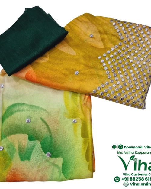 Designer Saree with Blouse, a green blouse fabric piece beside a yellow and green printed textile featuring scattered silver-toned circular embellishments