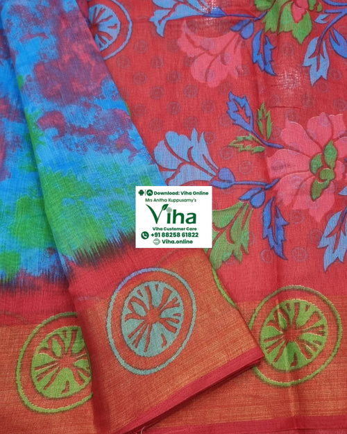 Soft Cotton Saree With Blouse, a red fabric features blue and green floral patterns alongside a blue tie-dye section and a border with seven circular motifs