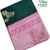Cotton Silk Saree With Blouse & With Pallu, folded dark green fabric with a wide pink and white patterned border and gold-toned floral motif