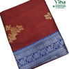 Cotton Silk Saree With Blouse & With Pallu, a folded red fabric with a blue and silver-toned patterned border and two gold-toned floral motifs