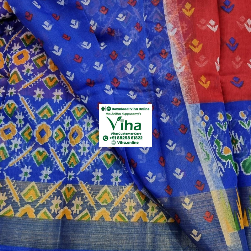 Soft Cotton Saree with Blouse, a folded fabric displays blue, red, purple, and green sections patterned with white, yellow, and red motifs