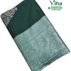 Cotton Silk Saree with Blouse, a folded dark green fabric featuring a wide silver-toned patterned border with floral and bird motifs